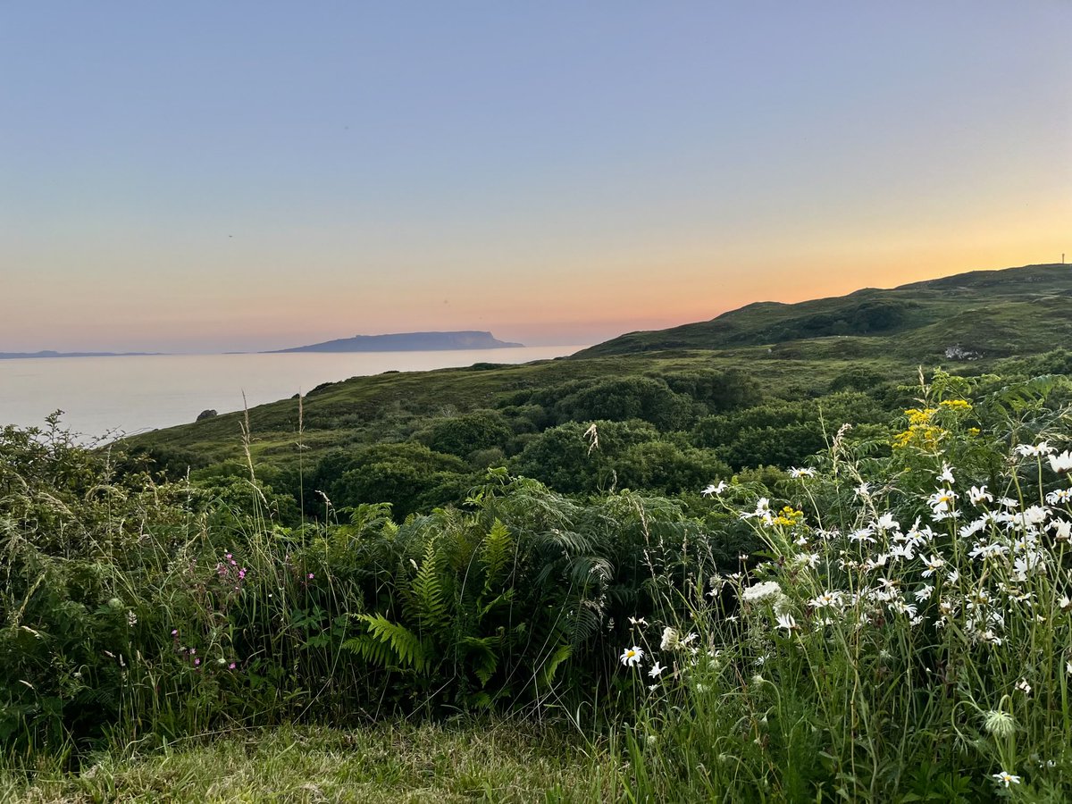 InEilidh's tweet image. Gentle sunset over the Isle of Eigg, viewed from the garden after a perfect couple of days in #Sleat #Skye