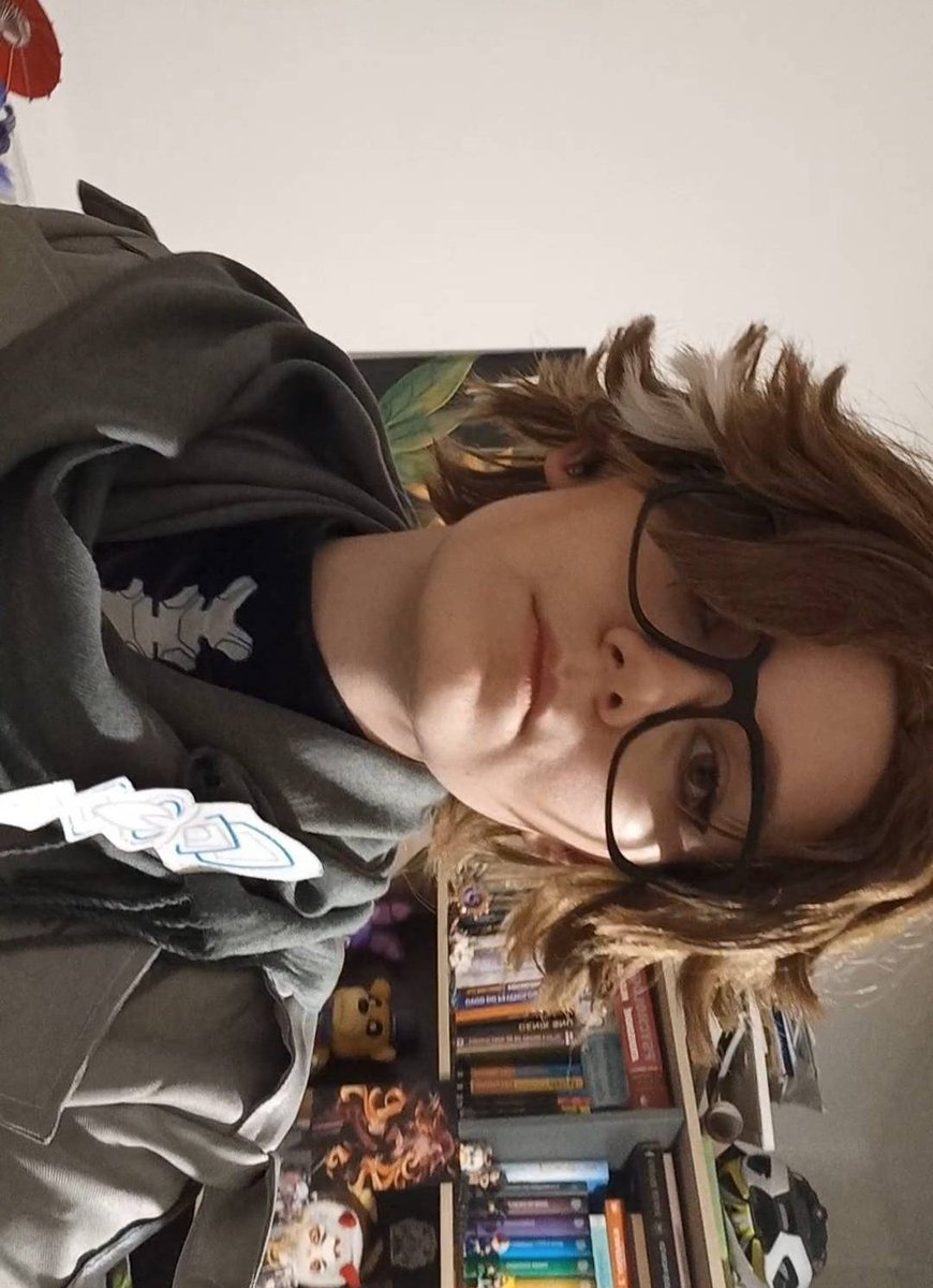 Boo, found an old cosplay photo -🦖