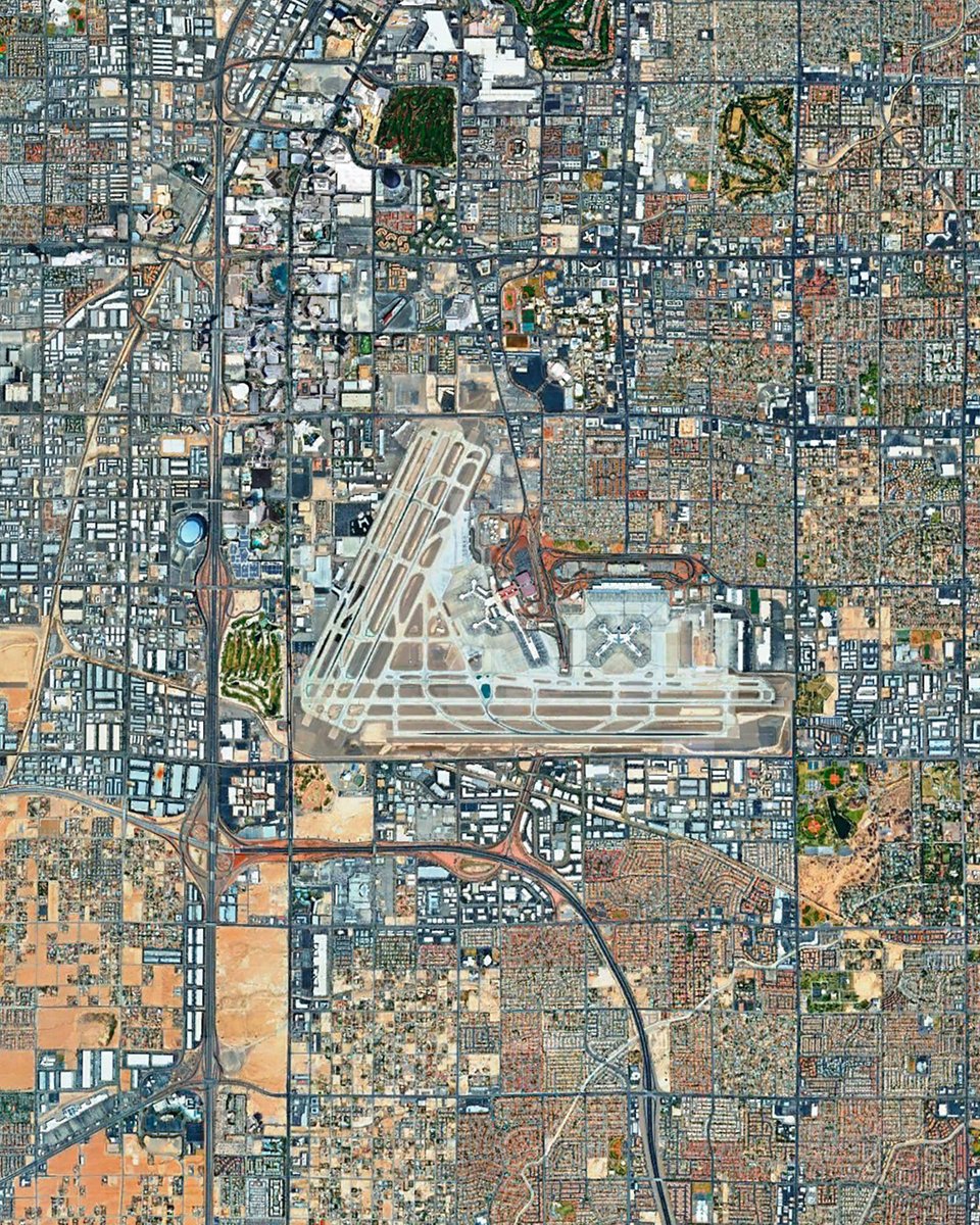 summacorp's tweet photo. 75 years ago in July 1950, a B-17 Flying Fortress outfitted with a large-format camera flew over Las Vegas to capture images for USGS topographic maps. Here's a few of those aerials, compared to the area today. 

McCarran Field / @LASairport https://t.co/x3vOOtPSzq