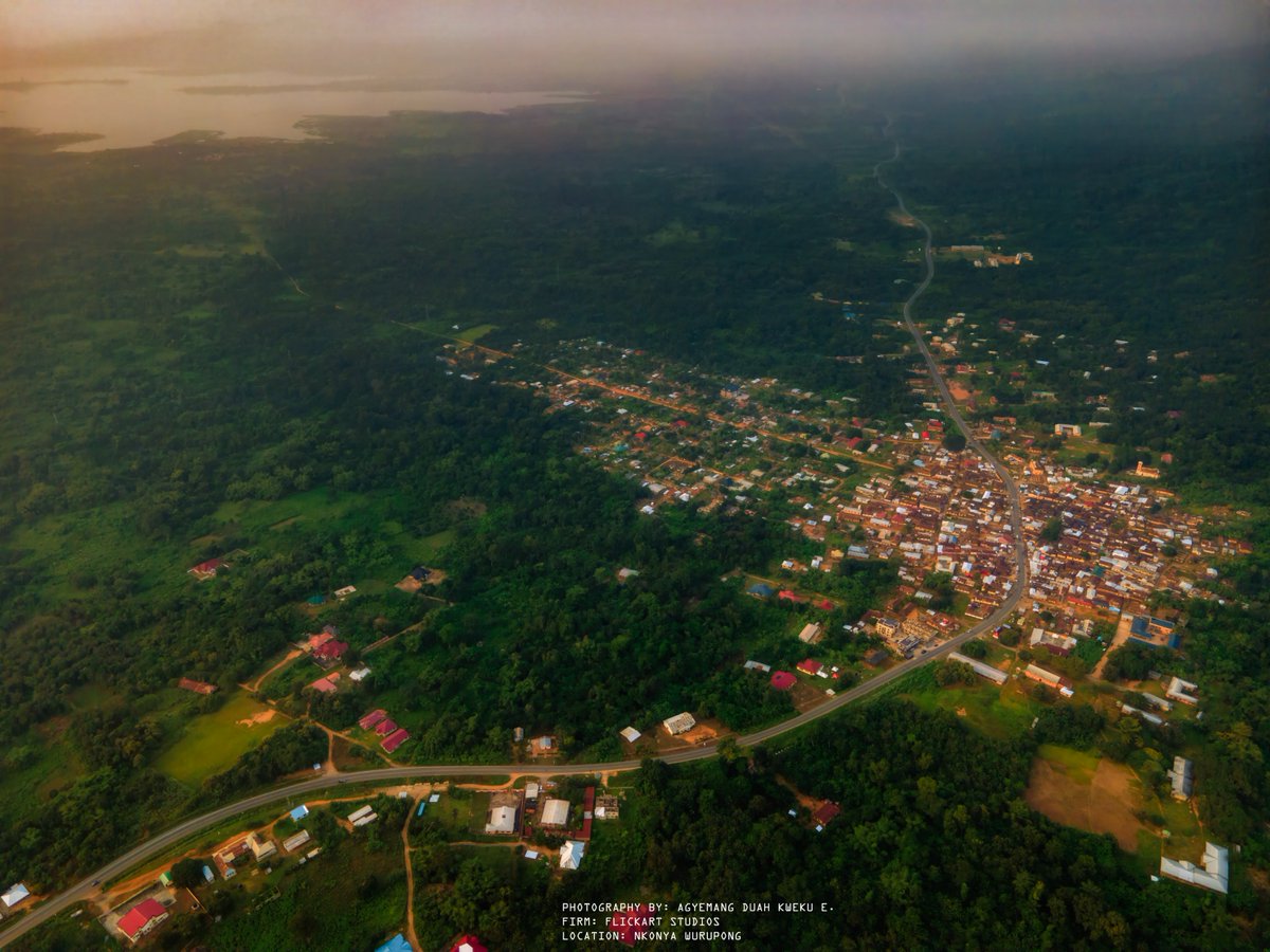 iQueiku's tweet photo. When I turned my drone on, I knew the view would be spectacular, but I didn't know this was the surprise that awaited me. Nkonya Wurupong (#Ghana) glows like the heart of the continent, cloaked in a #sunset only the ancestors could pain https://t.co/m3jYOGL274
