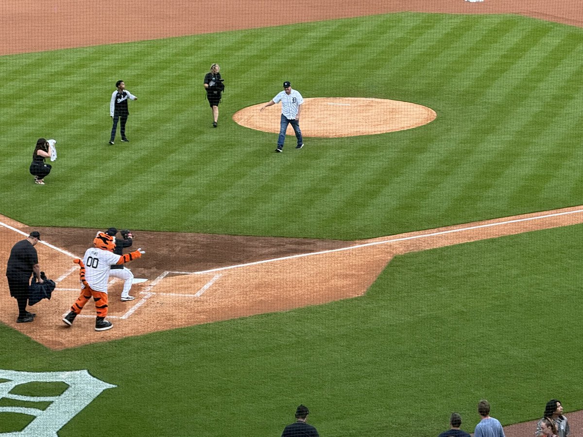 Former Tigers 3B Dean Palmer, one of the first free agents in which I was looking every day at the Detroit News to see if the Tigers would sign, throws out the first pitch. 

That was such a big signing then