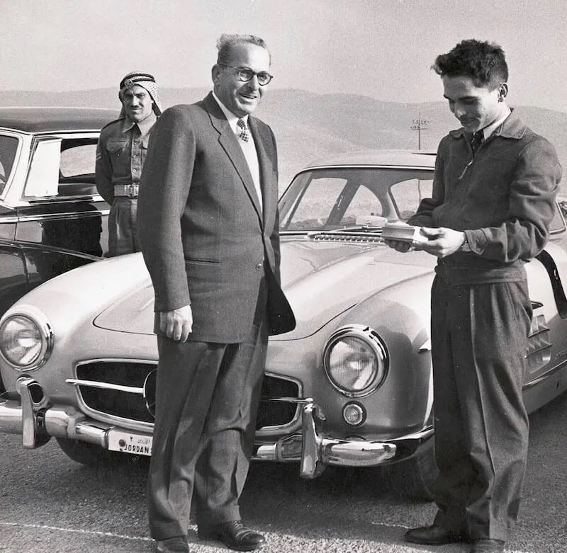 Hanna Tawfiq Gargour presenting the late King Hussein with the iconic 300SL Gullwing Mercedes that was developed from the successful 300SL W194 racing sports cars with which Mercedes had won the Le Mans 24-Hour race in 1952.