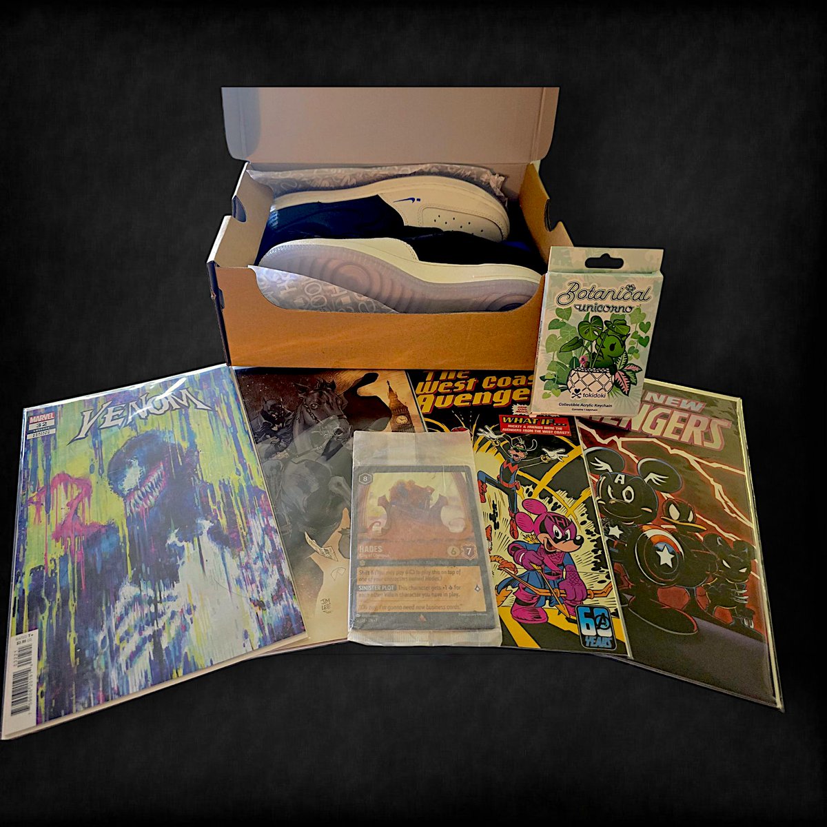 VeVeFamBam's tweet image. Check out this spread! Joined @y0_stephhh on her whatnot got me some cool stuffs! Now I get to rock some @dotSWOOSH & got my 1st @disneylorcana card! Hades rules! Love my #vevefam!