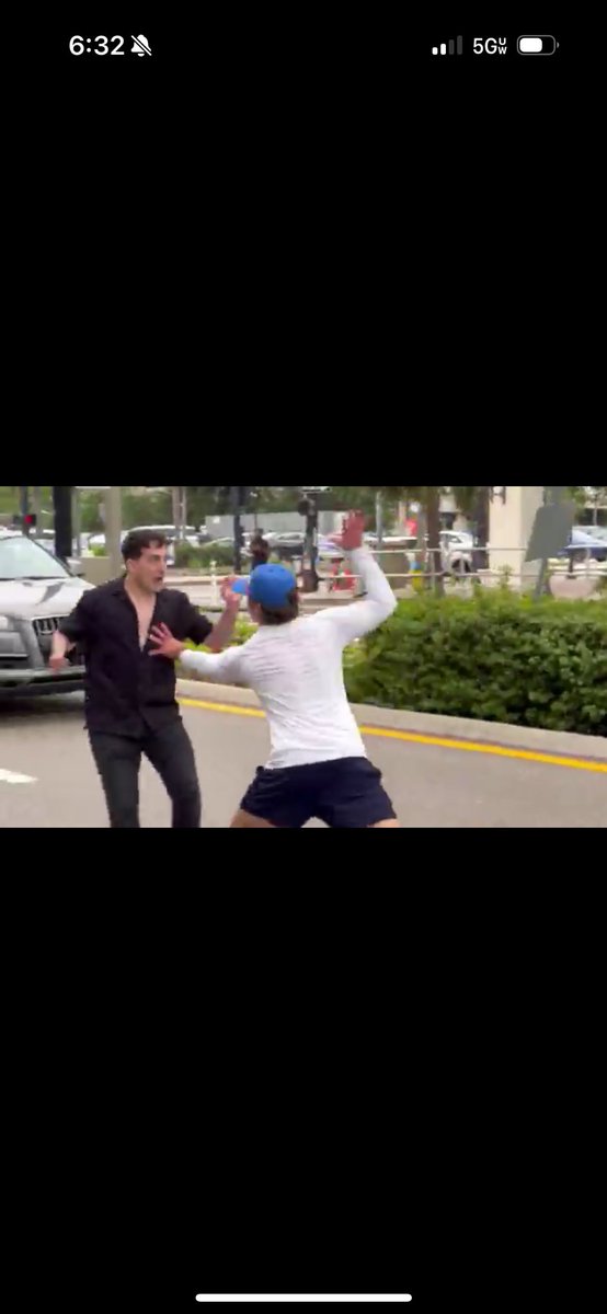 jerrhansen505's tweet photo. @EricLDaugh Hilarious how he tries to intimidate the guys behind the fence. Look at that pussy slap he’s winding up. Weak men are on the left https://t.co/LZ3vahmvYB