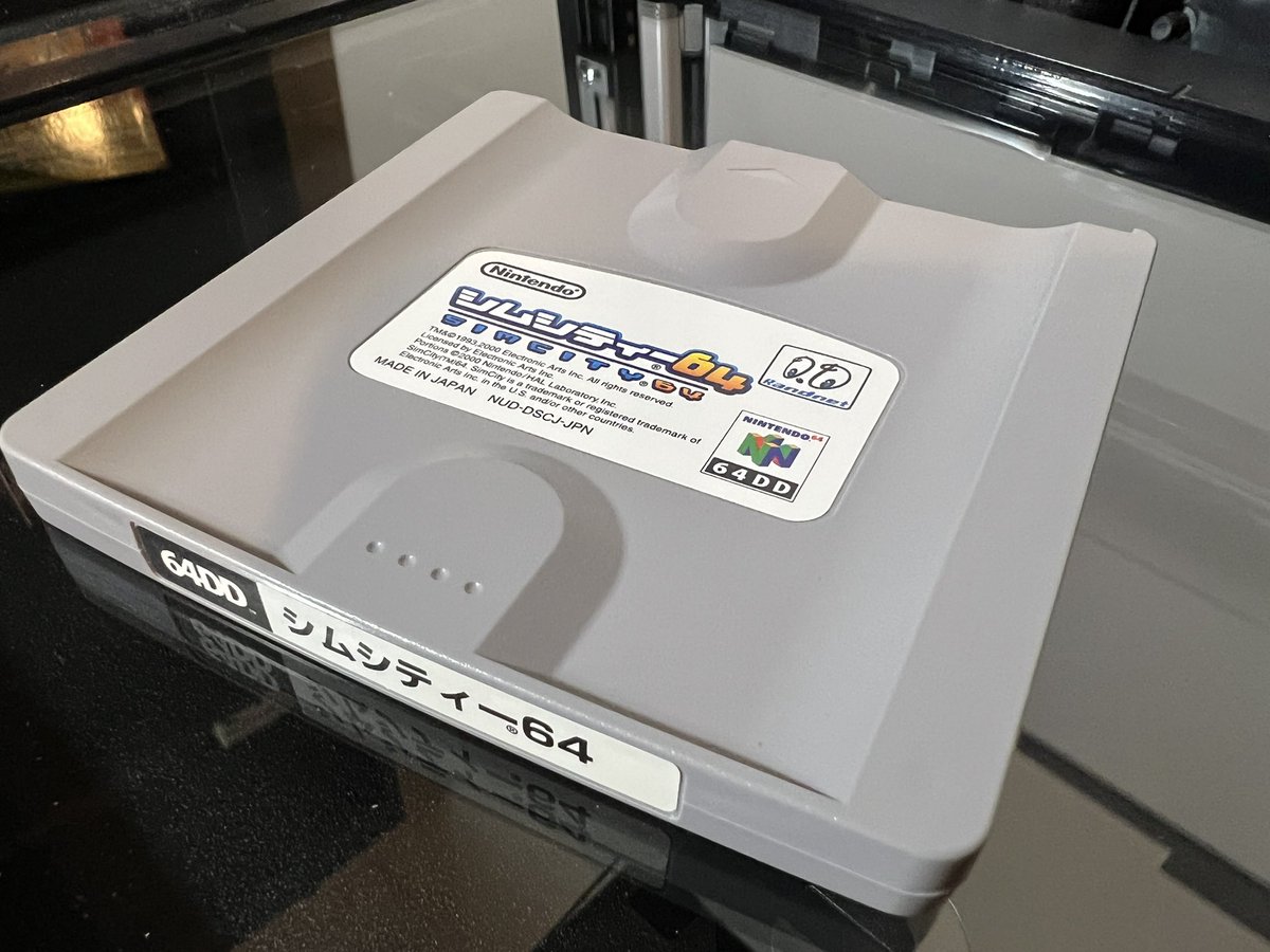 TanookiKuribo's tweet image. For no reason, here’s glam shots of Sim City 64 for anyone that’s never seen a 64DD disk 🤷🏻♂️