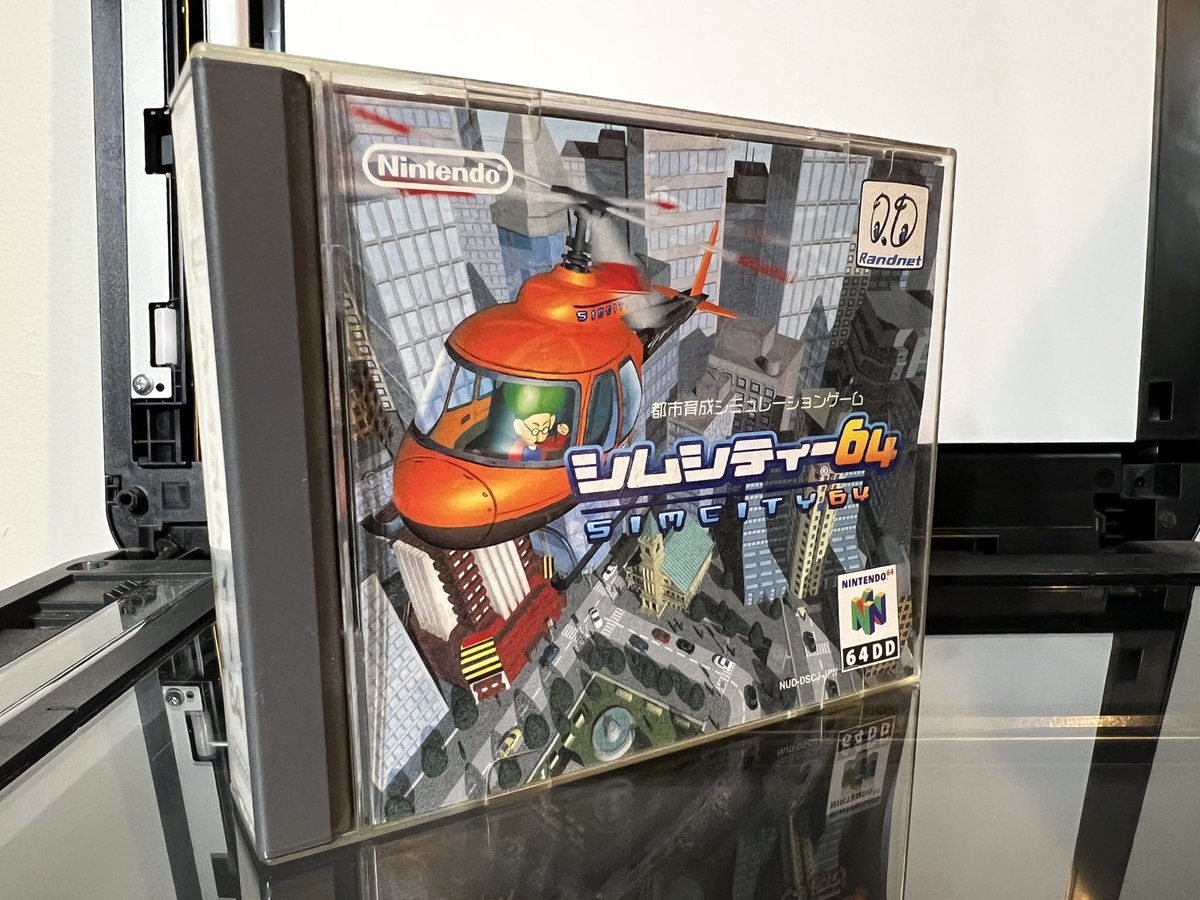 TanookiKuribo's tweet image. For no reason, here’s glam shots of Sim City 64 for anyone that’s never seen a 64DD disk 🤷🏻♂️