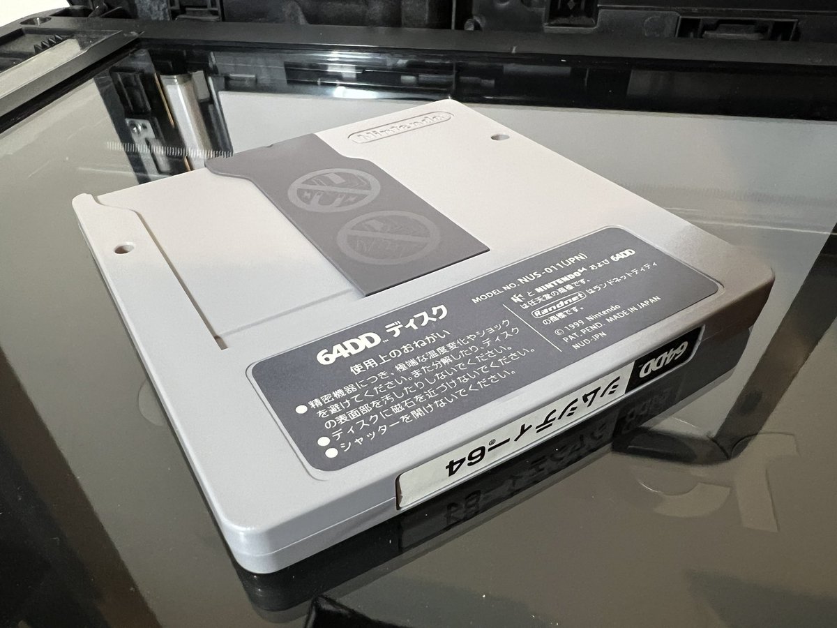 TanookiKuribo's tweet image. For no reason, here’s glam shots of Sim City 64 for anyone that’s never seen a 64DD disk 🤷🏻♂️