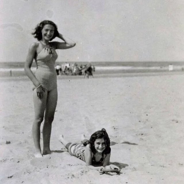 Anne Frank, with her sister Margot at Zandvoort Beach, 1940.

Right before their lives were stolen.
