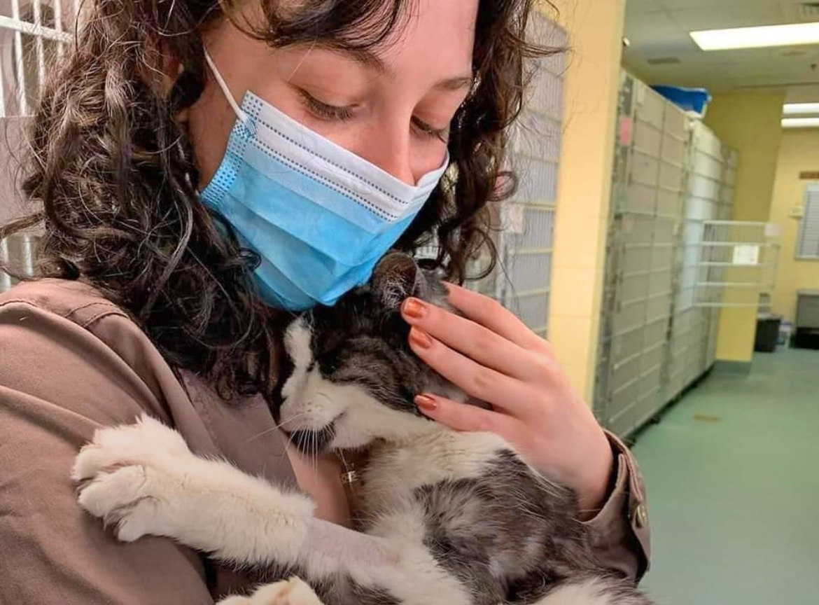 This woman adopted this 20-year-old cat from a shelter because she didn't want him to spend the end of his life alone in a cage.