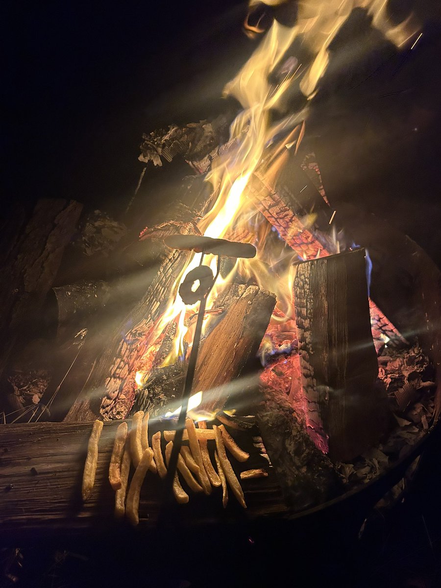 Reheating my <a href="/BurgerKing/">Burger King</a> over the camp fire! That’s a chicken fry and onion ring with the fries baking on oak. #fatkid #redneck #burgerking