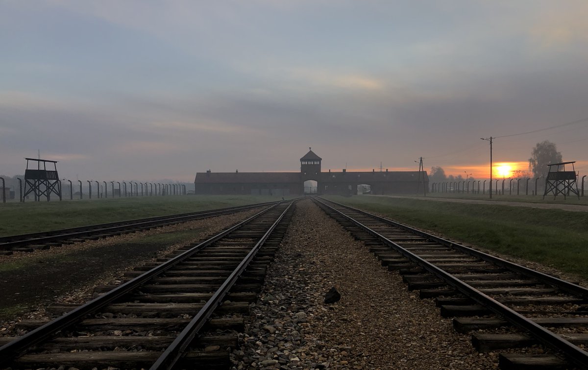Creating and spreading fake, AI-generated images of Auschwitz is a dangerous act of distortion. It not only falsifies history. It also desecrates and harasses the memory of the victims.

Below is an example of such a fabricated image: an AI-generated image of the main gate to the