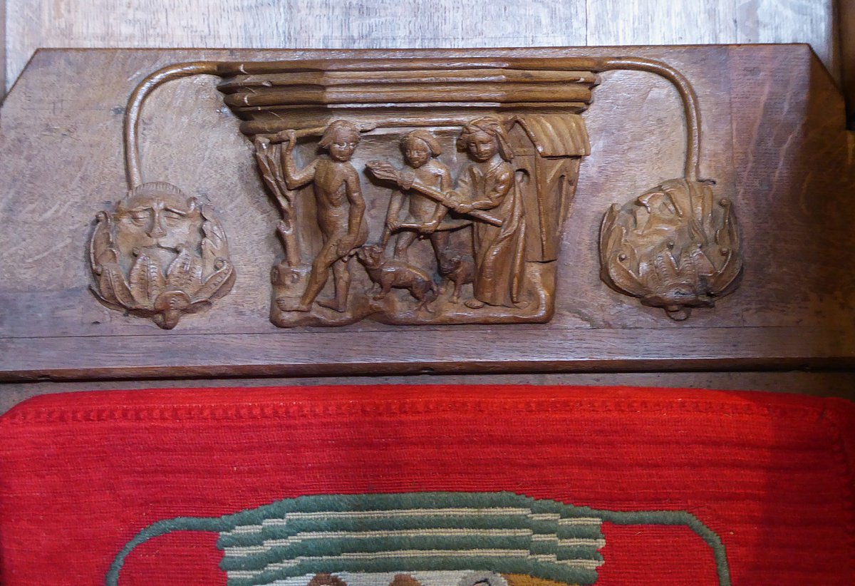 CathyRLowe's tweet photo. #SundayShocker Unbowdlerised Bristol misericord:
Here it seems that a naked priest wielding a staff flees from another unclothed fellow (his son?) whose cat Tybalt is biting his crown jewels, while the priest's mistress attacks him with distaff/broom. Reynard the fox looks on! https://t.co/DVZ0jC9vwC