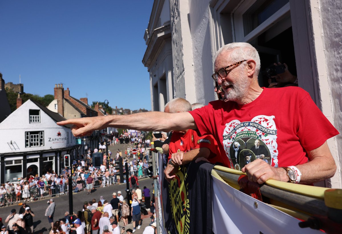 Corbyn wears a t-shirt featuring Marx and Lenin at the Durham miner's gala.

He still thinks real socialism has never been tried.