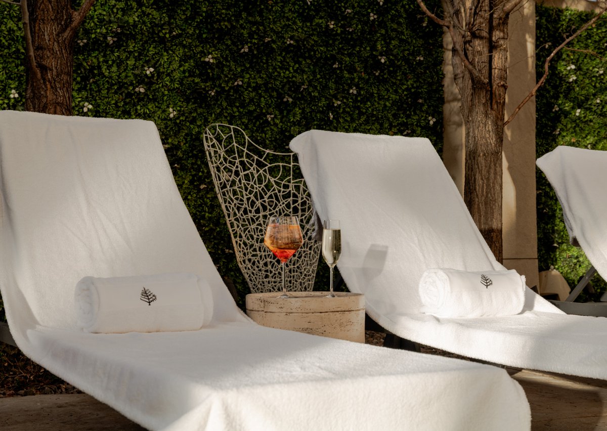 Poolside perfection. 🍊✨ 

Let our rooftop pool terrace be your personal retreat in the heart of the city. Reserve our Urban Oasis package for an upgraded experience, curated for the perfect summer stay. Link in bio.