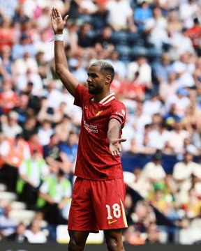 Photography of Cody Gakpo doing Diogo Jota's celebration after scoring against Preston.