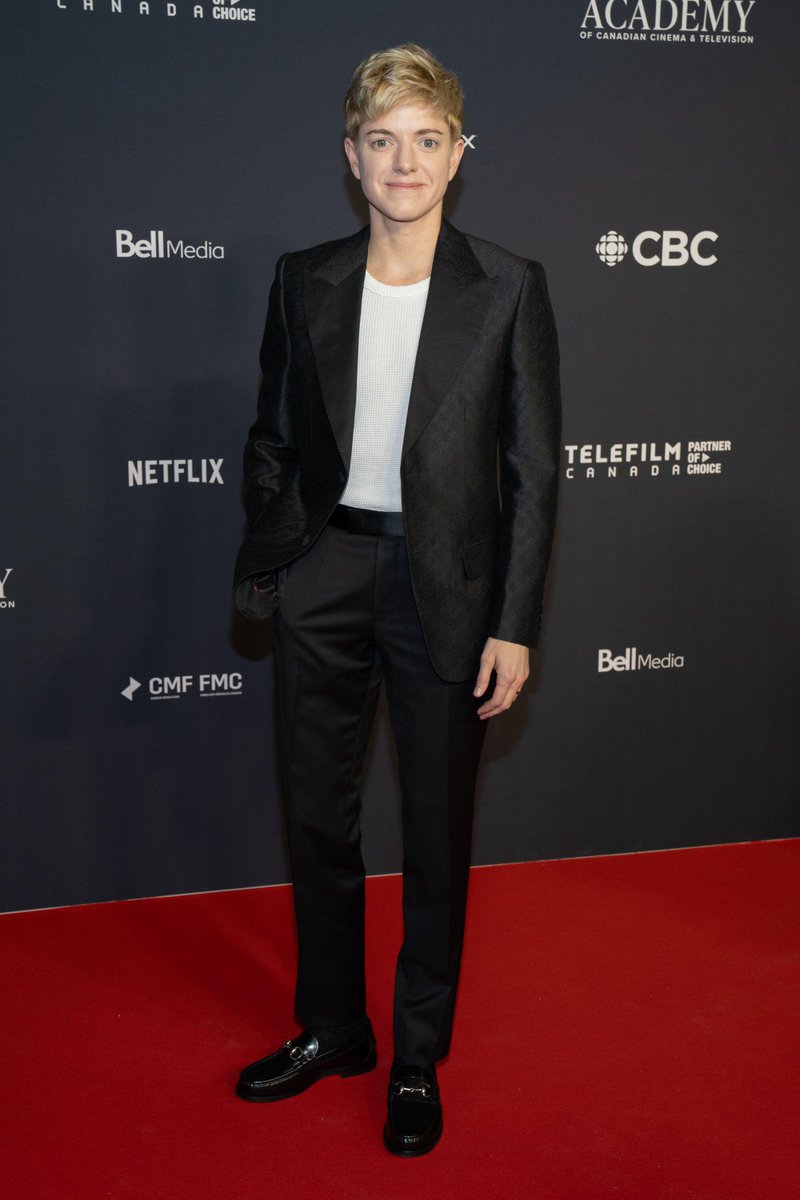 Canada's tweet image. As #PrideSeason continues, we're highlighting another Canadian 2SLGBTQI+ figure: Mae Martin! This hilarious comedian and singer educates on 2SLGBTQI+ topics through their work. Canada is so proud to be home to such a multi-faceted icon!