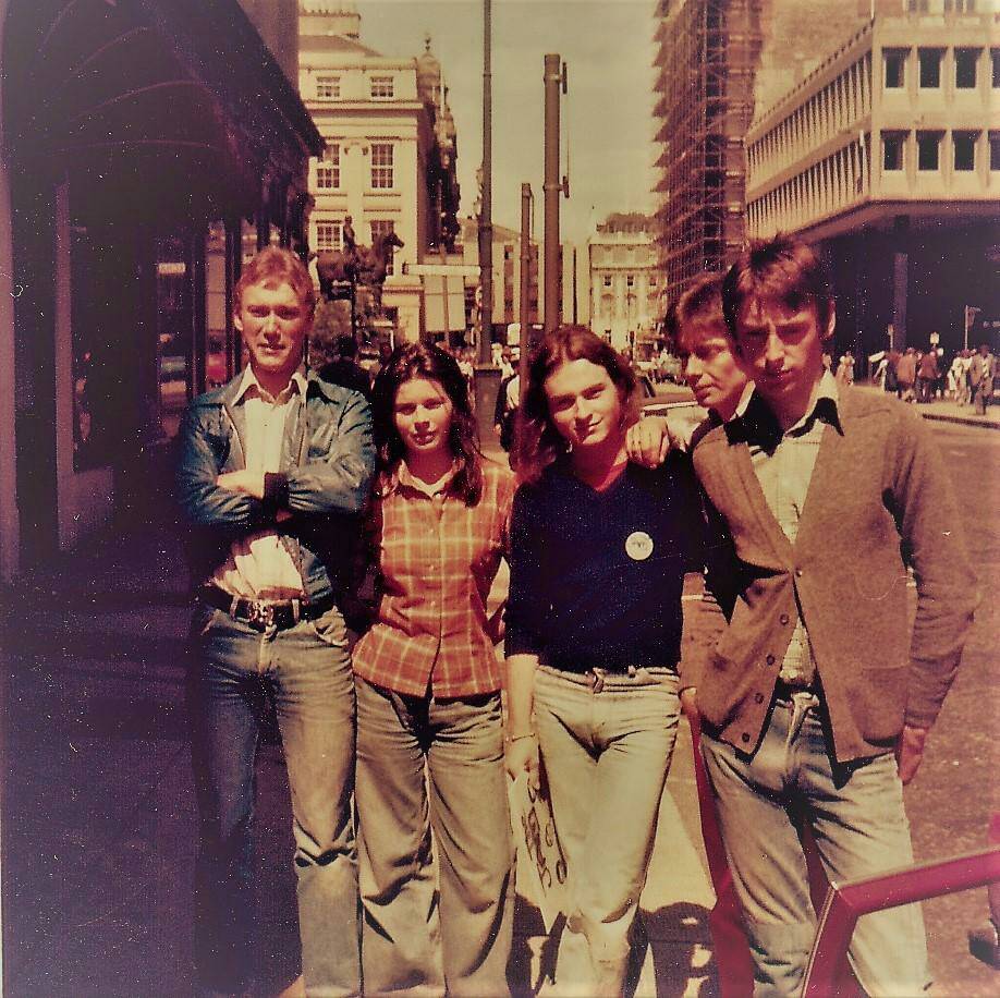 13 July 1977 The Jam were meant to play Shuffles, Glasgow, but the venue was changed to Zhivago’s. 

Here they are in Queen Street In The City with some lucky fans (see what I did there?) 

Picture by Den O'Harkin 

#TheJam #OTD
