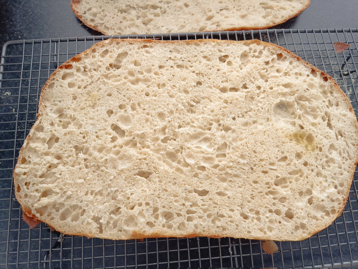 NordicLaura's tweet photo. Schiacciata. This is delicious and a great sandwich bread. #bread #baking #homemade #schiacciata #dough #loaf #italian #italianbread @cotswoldflour @allinsonsflour @maldonsalt @filippoberio_uk https://t.co/E2PP83ebJF