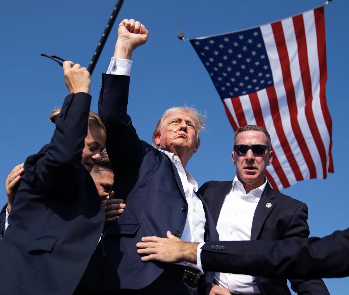 barrforsenate's tweet image. God spared President Trump’s life in that Pennsylvania field one year ago today, because he had a bigger plan. Our President showed incredible strength under fire and inspired us to always “fight, fight, fight” for the country we love.