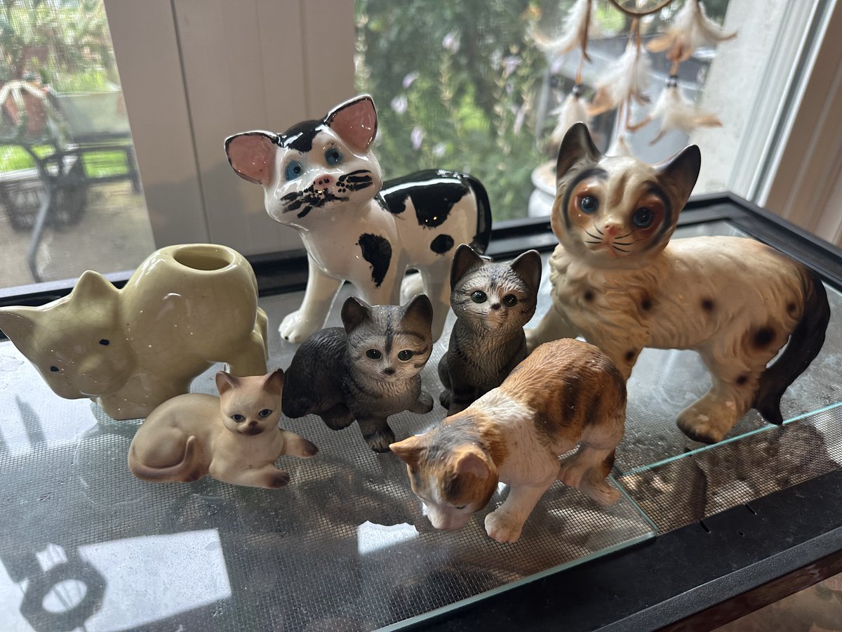 Nyazsche's tweet image. Whenever I go to a flea market I always gotta pick up some ceramic cats. They all look so sad, they need a loving home.