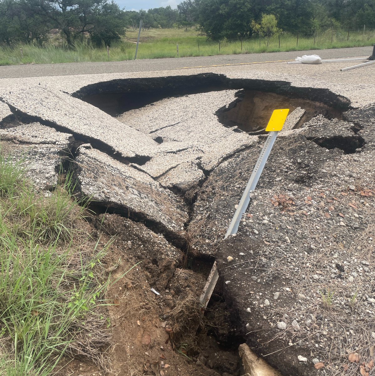 Know before you go. Heavy rain caused more roadway damage today. These photos are from RM 2323, southwest of Llano. Crews will be working on repairs as soon as possible. Before you head out, check drivetexas.org for the latest road conditions. #txwx