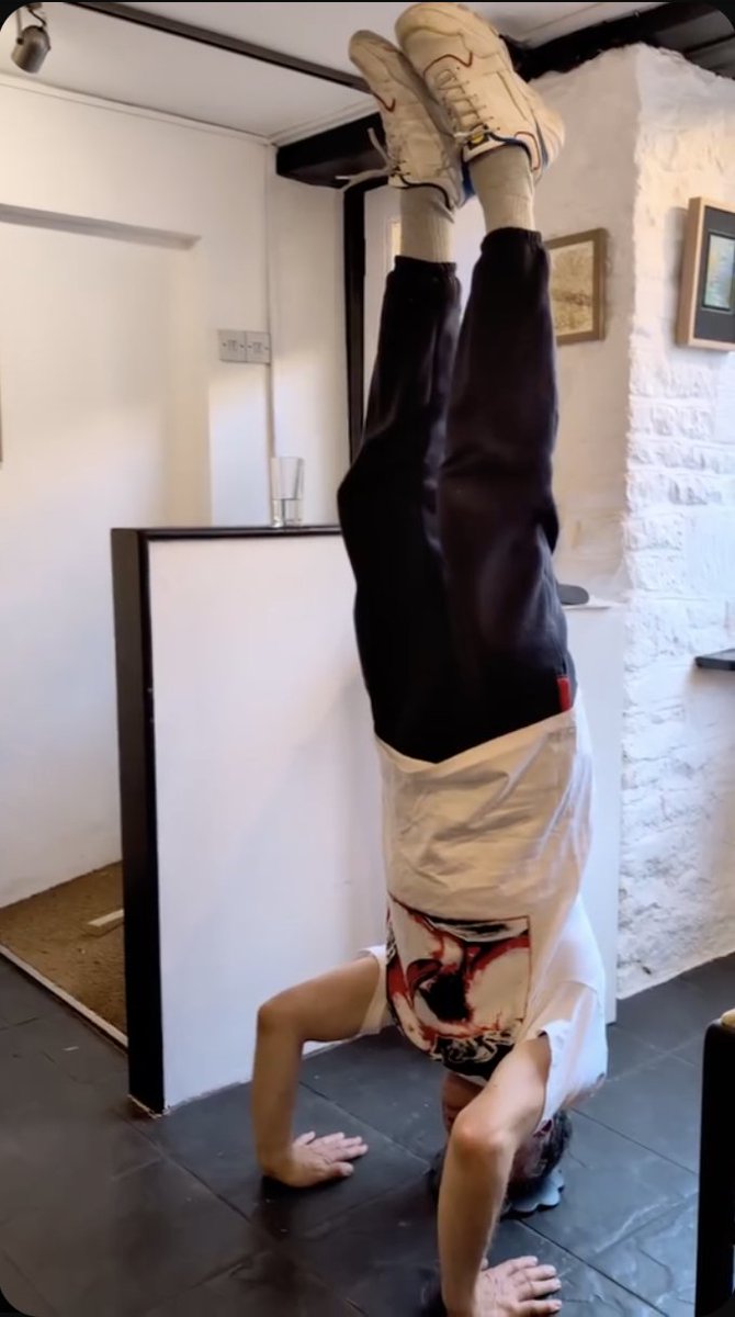 Presenting my book Fascist Yoga at Art And Talking in Chipping Norton yesterday, 12 July 2025. Explaining here that if my local sports centre had offered a traditional gymnastics option of learning headstands to combine with public speaking, I'd have never entered a yoga class...
