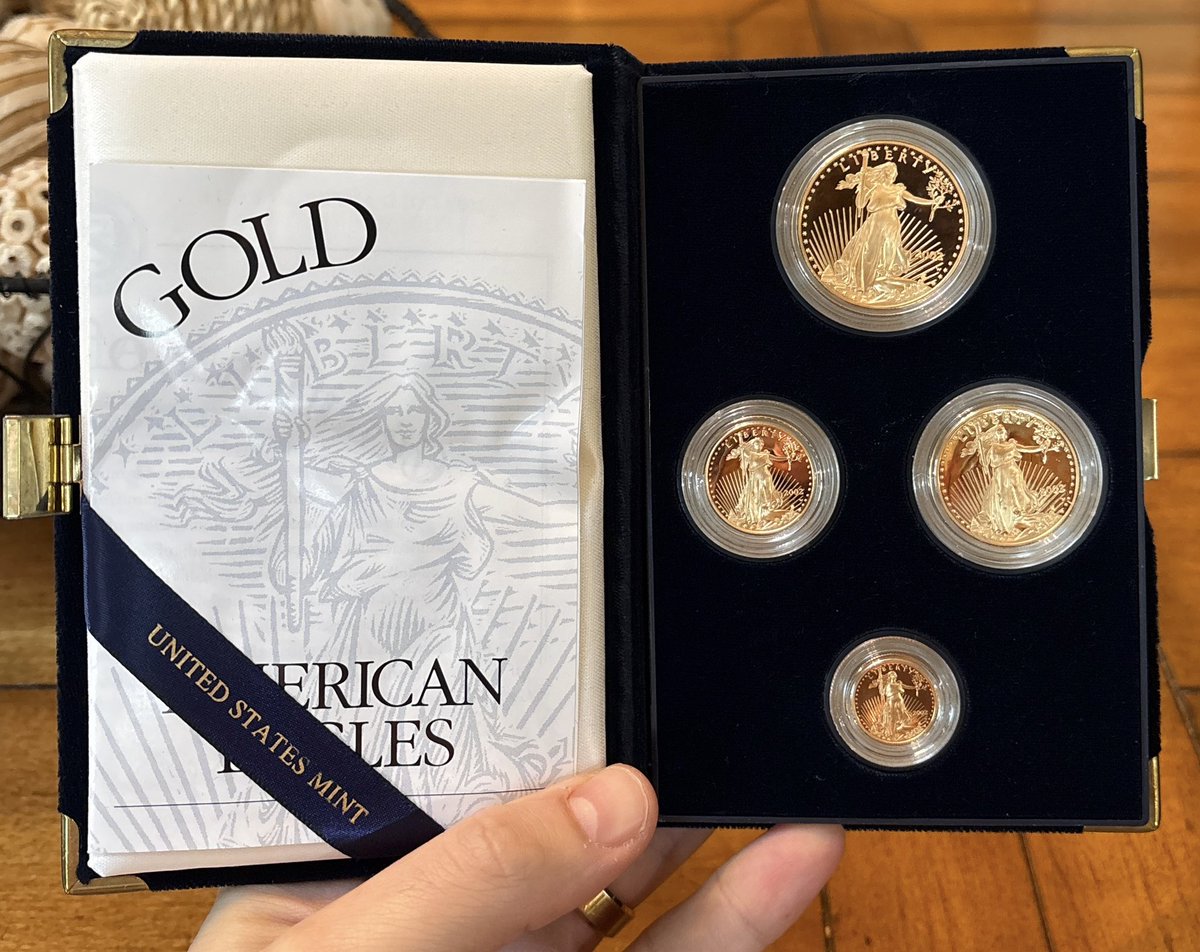 Im a firm believer that everyone should own 5 ounces of Gold as both a hedge/emergency fund

How many ounces do you think should be the bare minimum?