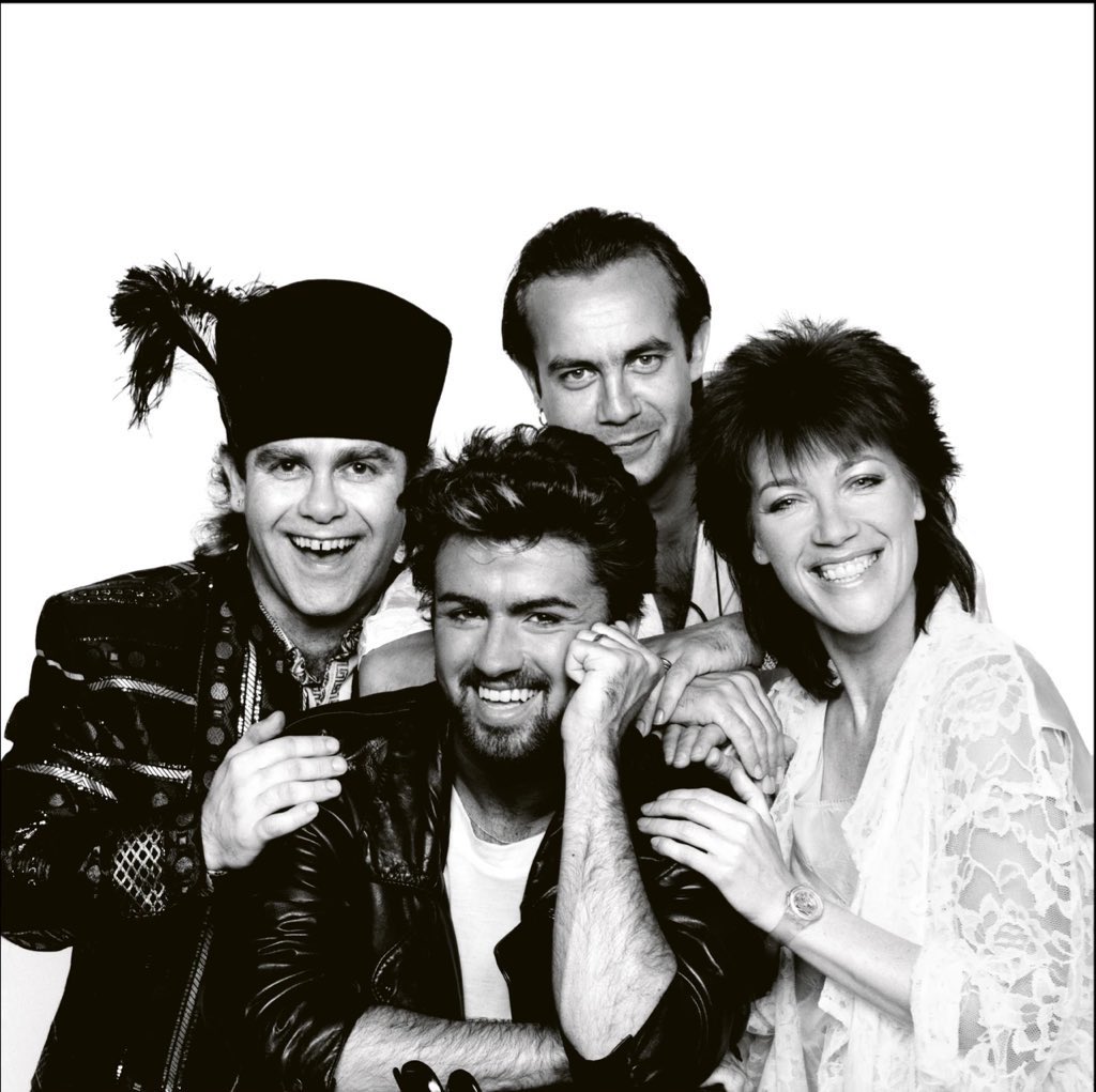 crazymandance's tweet image. George Michael photographed at Live Aid with Elton John, Bernie Taupin, & Kiki Dee