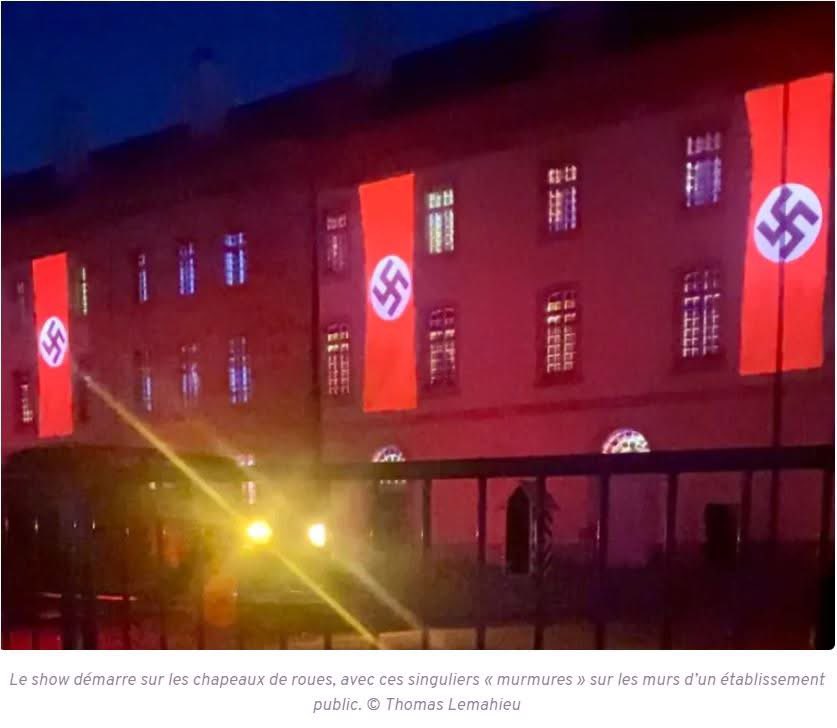 On ne défend pas la République en finançant ceux qui veulent la rayer de l’Histoire. Ce week-end à Moulins, Les Murmures de la Cité a projeté des croix gammées sur un bâtiment public.

La Révolution ? Effacée.
La République ? Oubliée.

À la place : des rois, des empires, des