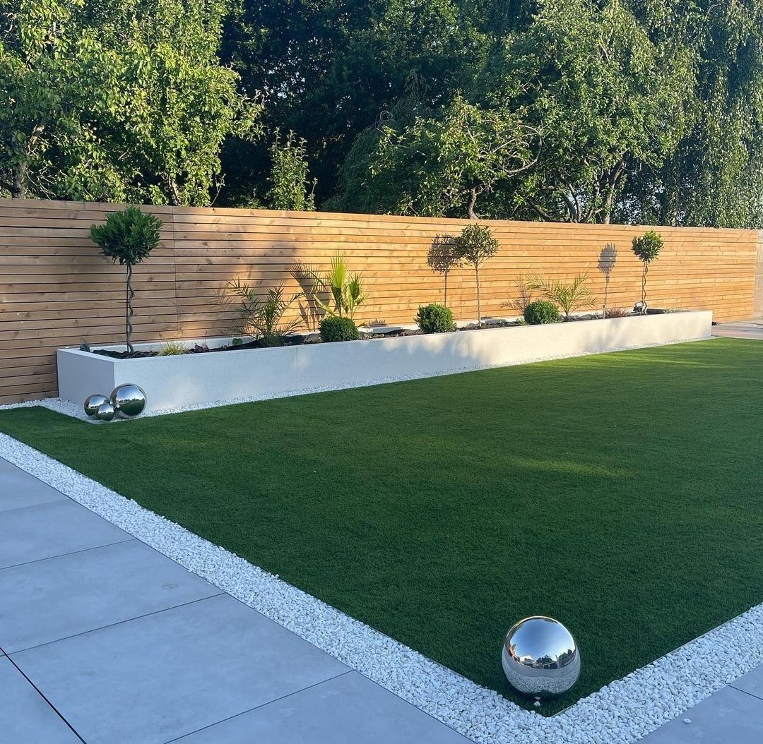 Shitlawns's tweet image. "We've got a spare ball boss, what do we do with it?"
"Just plonk it randomly like you did with the plants!"