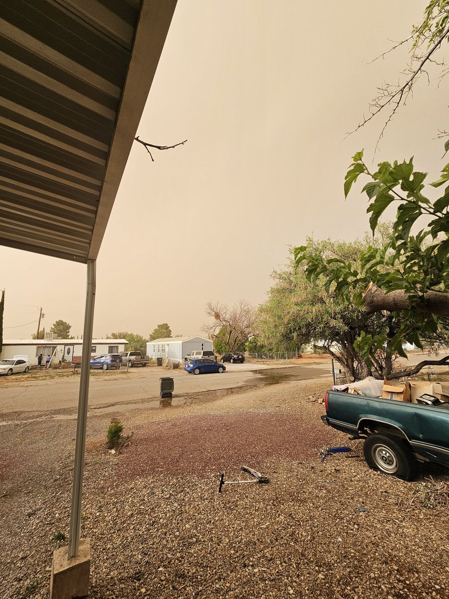 Dust storm moving in. In almost 19 years I've never seen one in town.