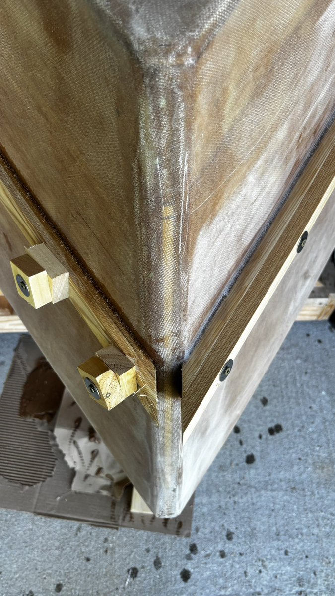 Laminating the spray rails using cypress and thickened epoxy.