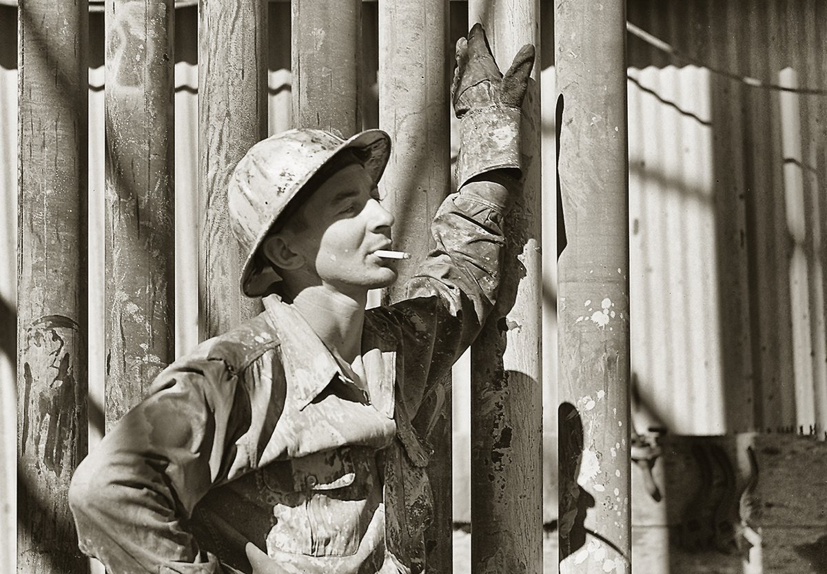A roughneck in Andrews County, 1942. I think we might be witnessing an OSHA violation! 😀