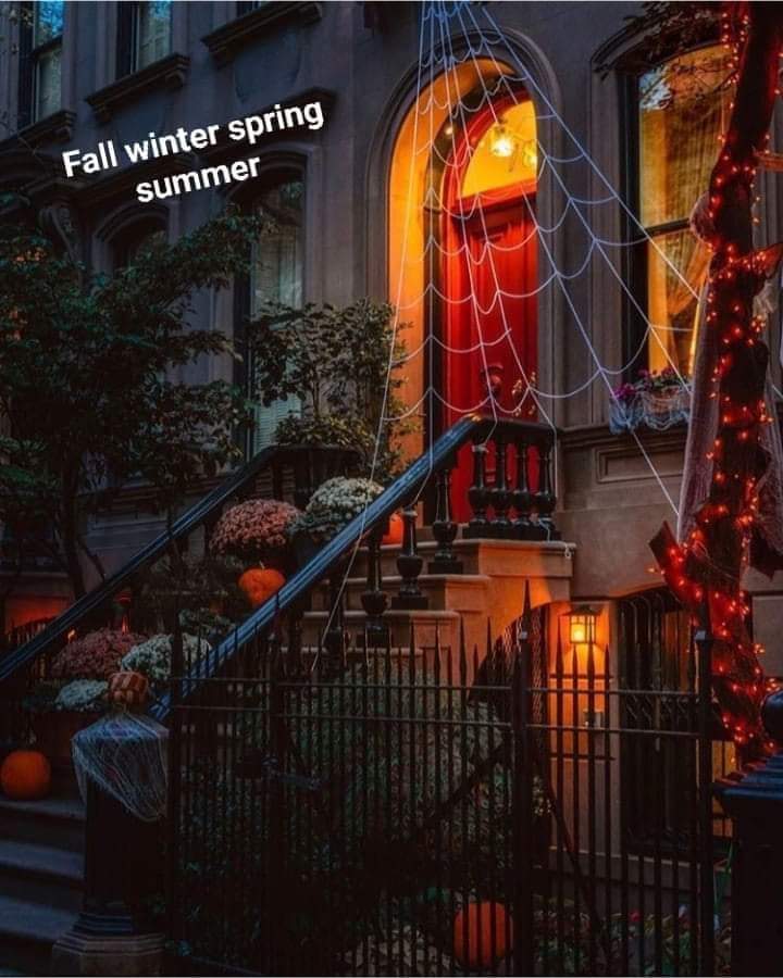 ScaryAllYear's tweet image. This haunted brownstone glows with Halloween fright—pumpkins, spider webs, and red lights invite trick-or-treaters to a spooky night year-round! #SpookyDecor #HorrorCharm