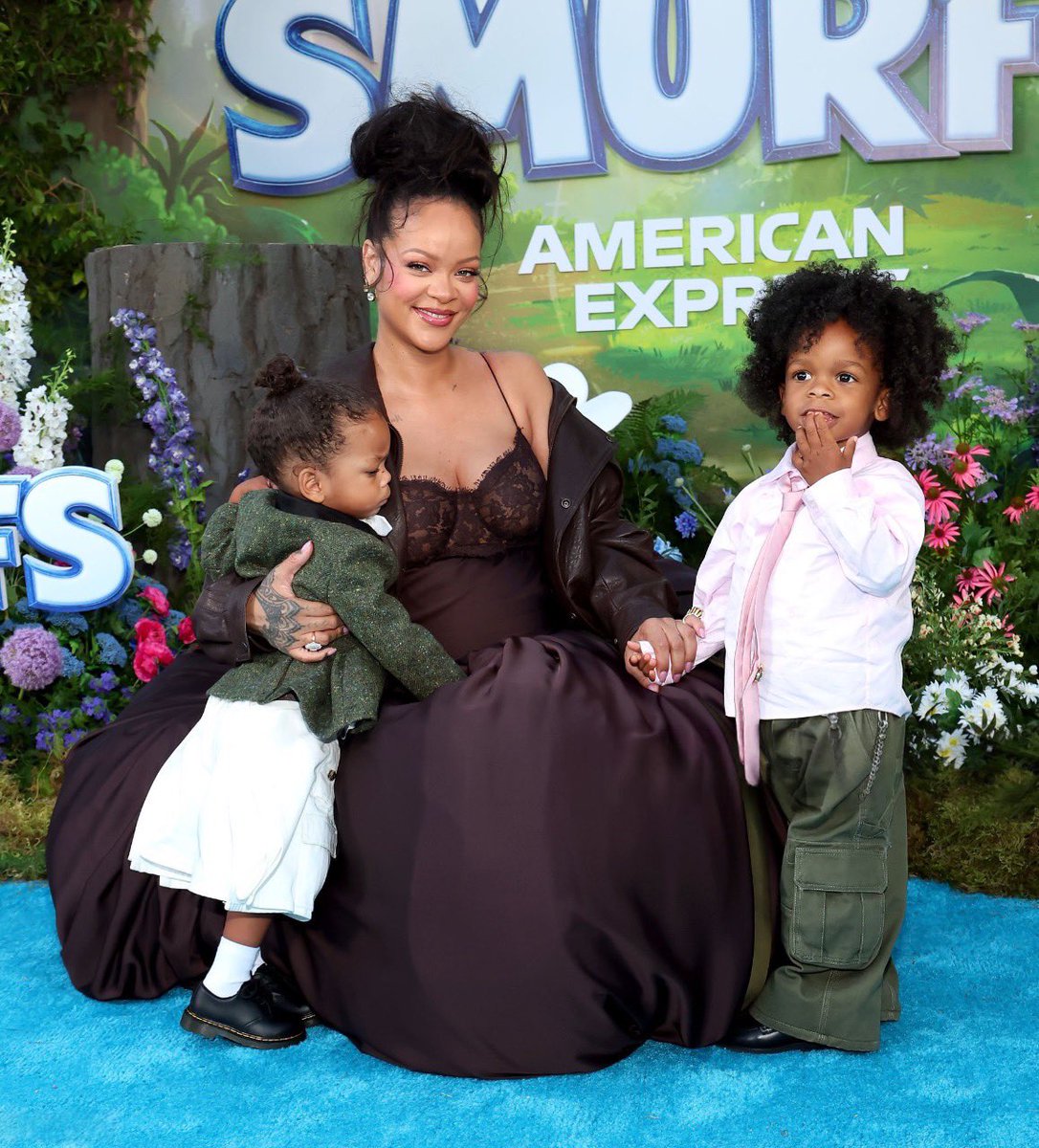 awgecentral's tweet photo. Rihanna with her sons Rza &amp; Riot at the Smurfs Premiere in LA 🩵 https://t.co/KQ2SOGx56h
