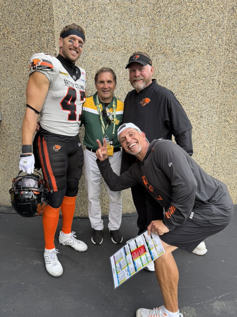 CoachCMcD's tweet photo. Great night in Edmonton, topped off by seeing the Legend @DRockEsks  With my guys Kyle Nelson &amp; Mike Benevides ⚫️🟠🏈 https://t.co/1QQTERvf4j