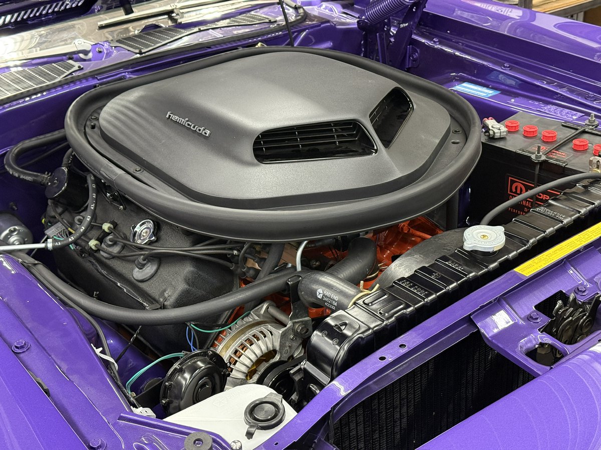 Oh, this old thing?  it's just a '70 Hemi Cuda four-speed inViolet.