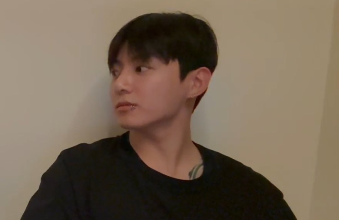 HIS CHEST TATTOO PEAKING.