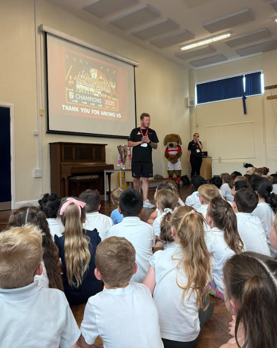 _Sandringham's tweet image. The children loved having a visit from Doncaster Rovers Mascot Donny Dog and the team. They had an assembly all about Resilience and Ambition and then got to take some pictures with the League 2 Trophy! @ExceedLP