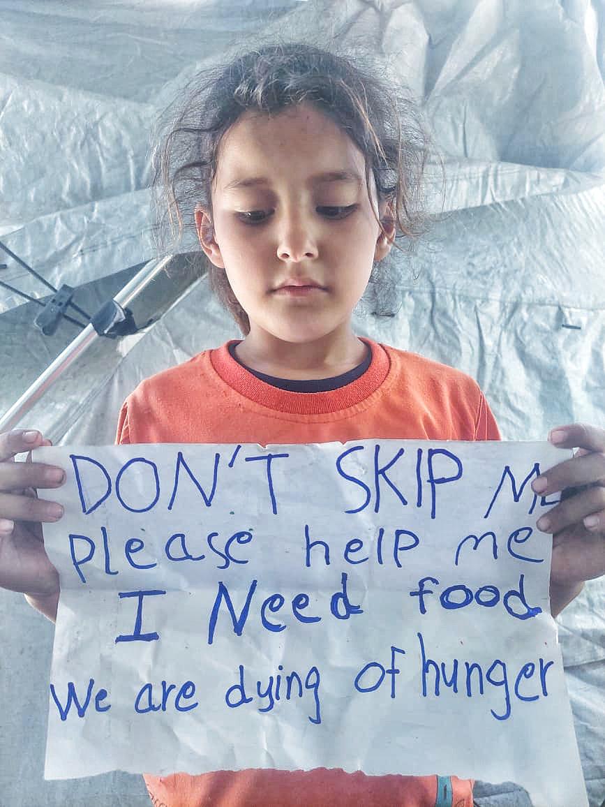 Hunger was gnawing at Mira's body every moment, as if time had stopped to witness her suffering. Flour prices rose, crossings were closed, and getting food became like a distant dream. We spent entire days without food, and whenever she looked at me, her words would pierce my