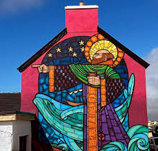 fiannafact's tweet image. On the Belmullet Peninsula, a new mural caught me off guard and filled me with awe, something I hadn't felt in years. If murals like this began to appear on gables around Ireland, they might speak volumes to those who’ve come without understanding: this place has depth, history,…