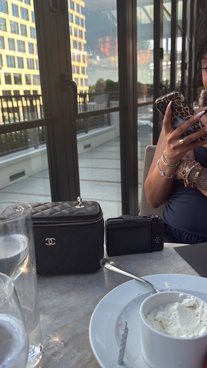 ain’t nothing but lip gloss in that purse just how i like it