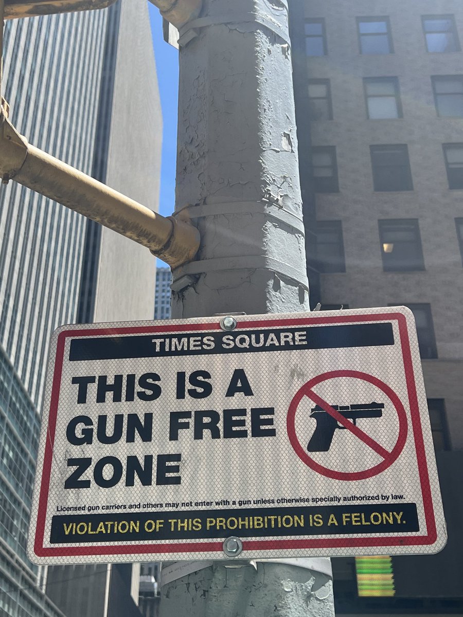 SandraNavidi's tweet image. A sign on Times Square. Sad that this is needed … #guncontrol