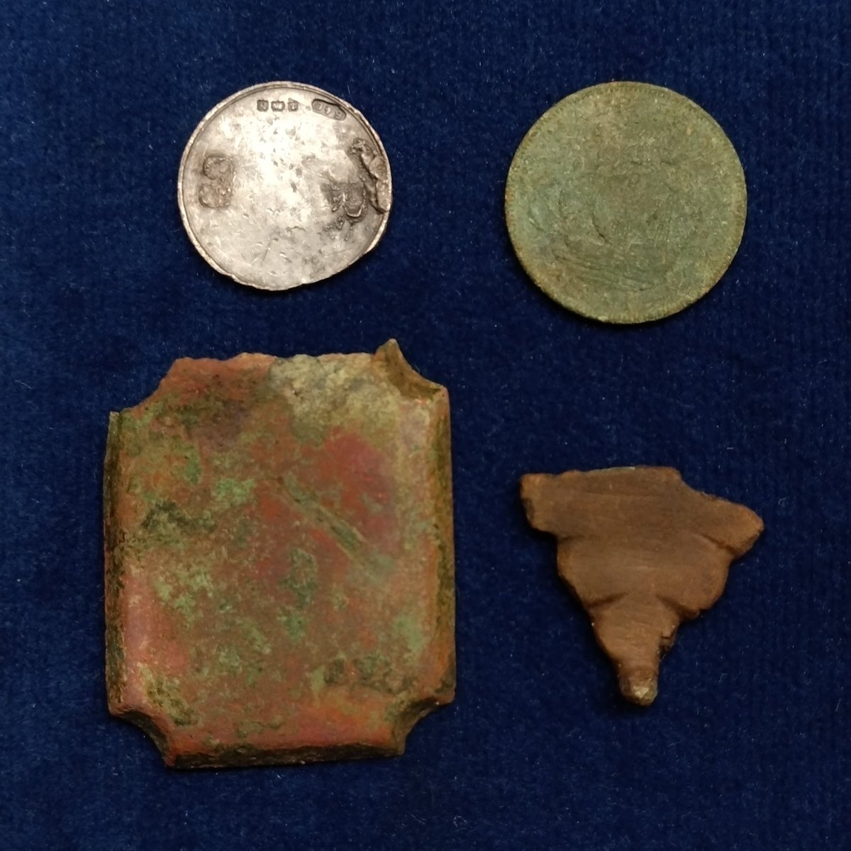 SDetectorist's tweet image. Best bits from tonight.
Silver disc, Hallmarked 1937.
Possibly a brooch as remains of fixing solder on back. No idea what was going on with the front.
A ship halfpenny, date illegible
Horse brass
Piece of worked bronze, perhaps medieval.