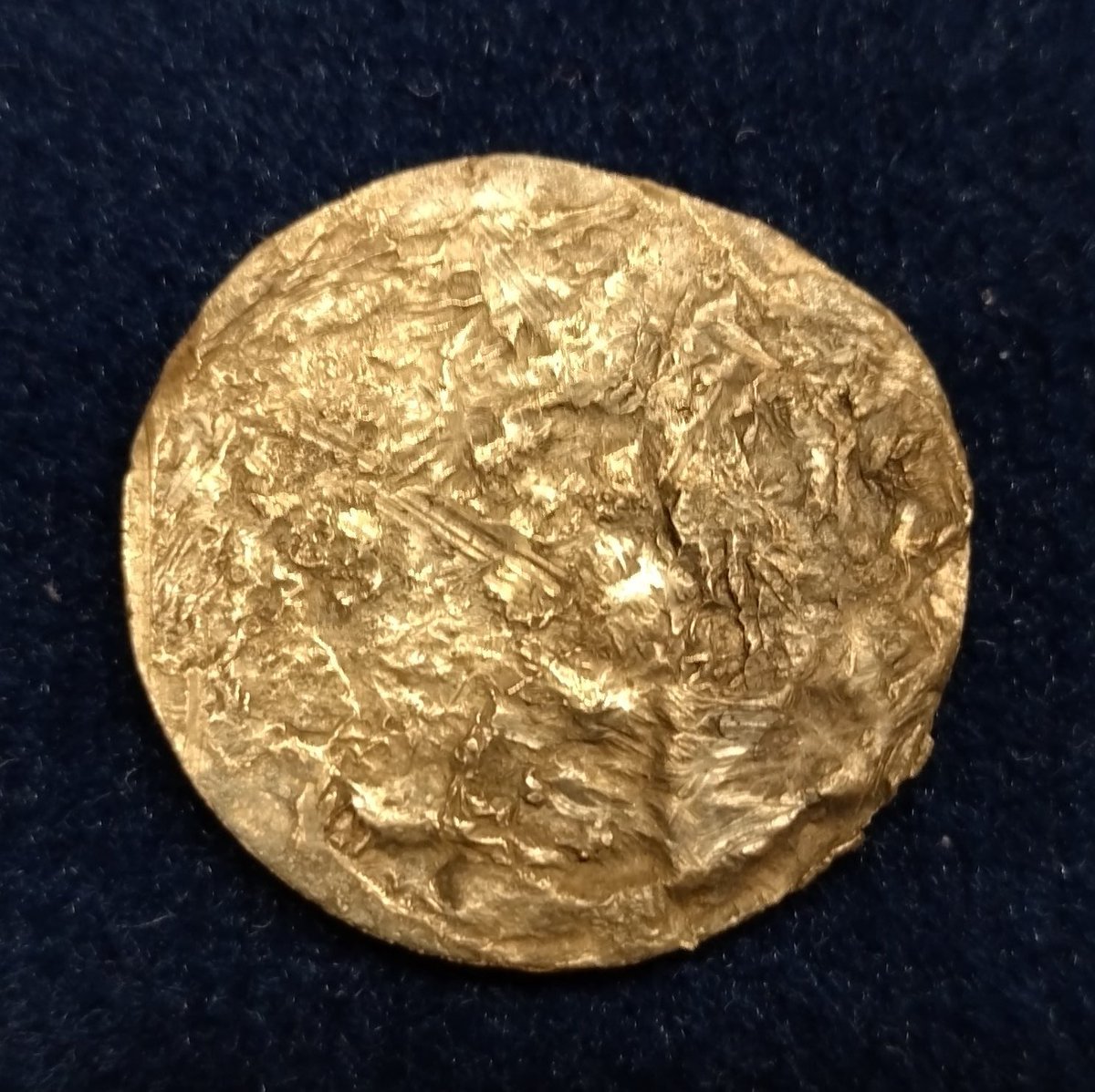 SDetectorist's tweet image. Best bits from tonight.
Silver disc, Hallmarked 1937.
Possibly a brooch as remains of fixing solder on back. No idea what was going on with the front.
A ship halfpenny, date illegible
Horse brass
Piece of worked bronze, perhaps medieval.