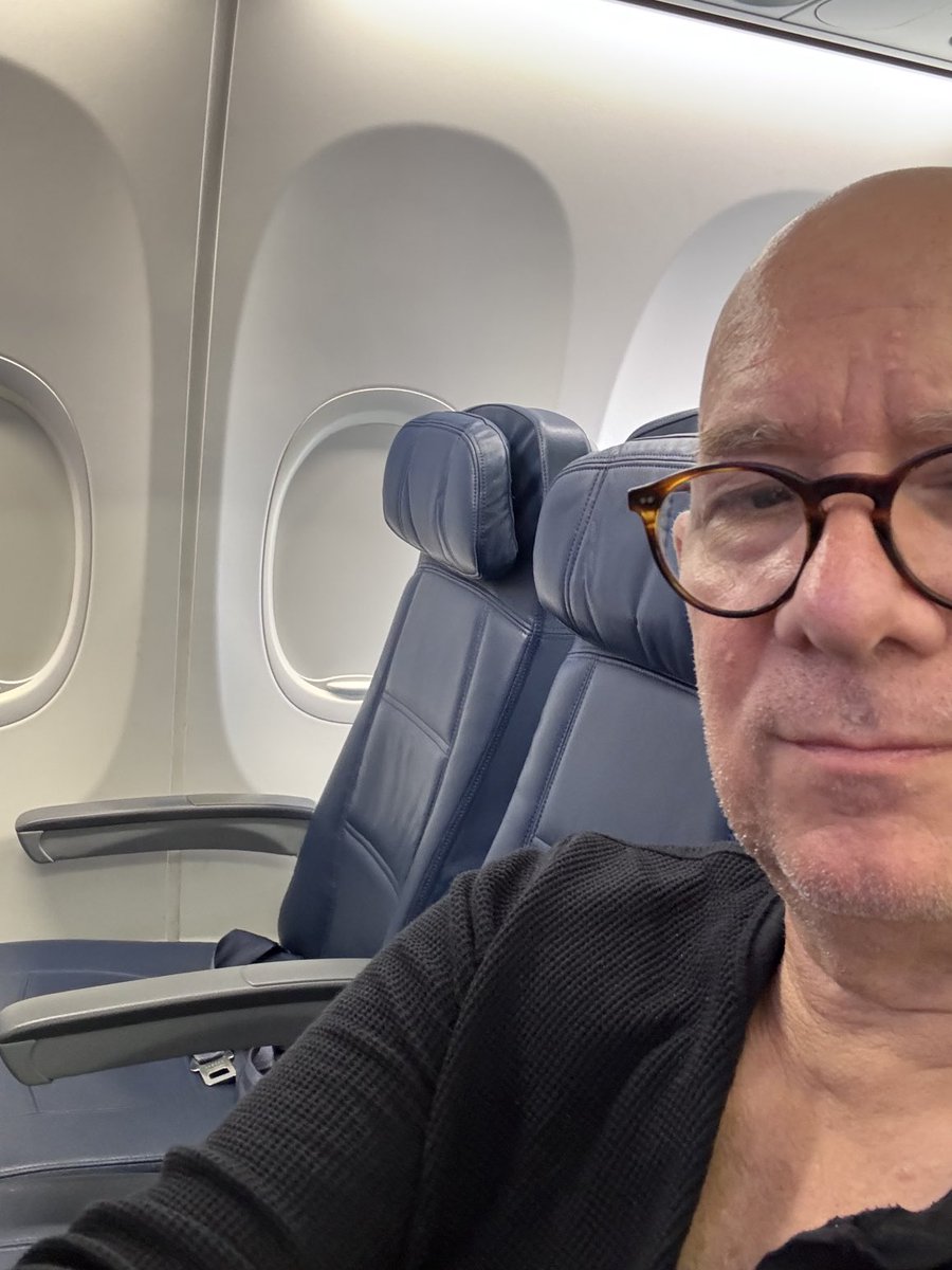 maguirekevin's tweet image. Cross country flight with two empty seats next to me. The poor man’s first class.