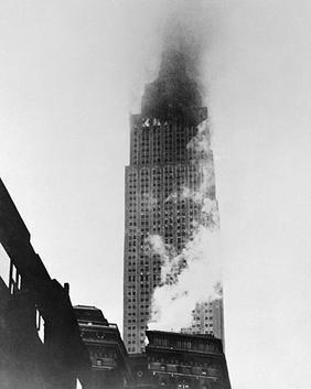 HistorylandHQ's tweet image. The upper floors Empire State Building in flames after a B-25 Mitchell crashed into it in heavy fog on July 28th, 1945.