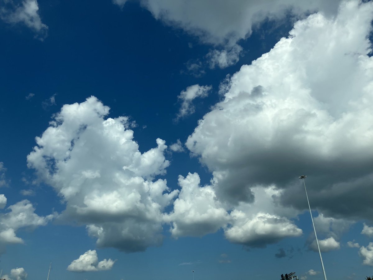awake_human's tweet image. At least I have cool clouds to look at stuck on a dead interstate 😉