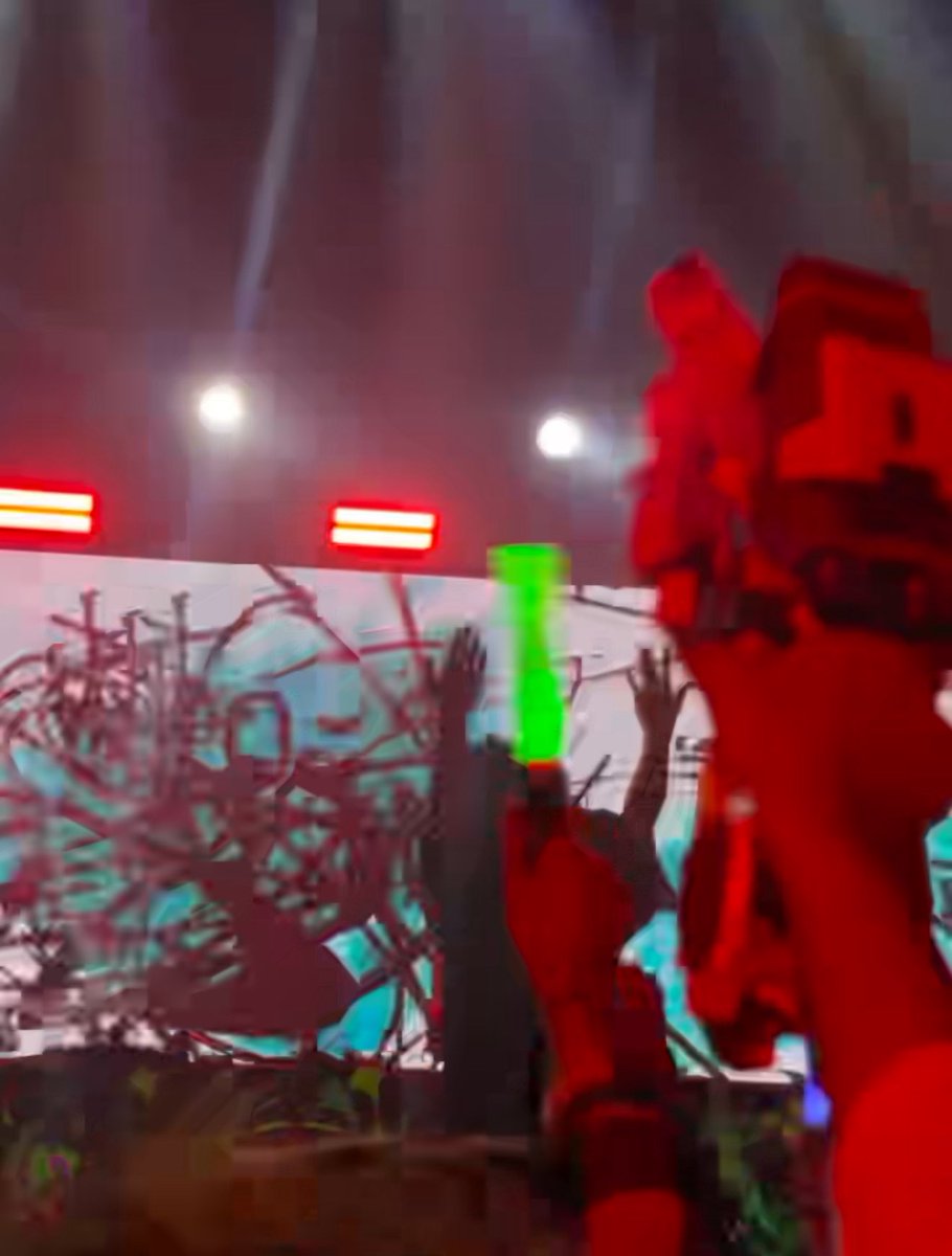 decepticonSIC's tweet image. / i was rewatching some of the vids i took when i went to see kikuo live back in february and just realised the person in front of me was waving a skyfire figurine around 😭😭 but i didn’t know anything abt tf back then i was just mad bc it was in my way LMAOO