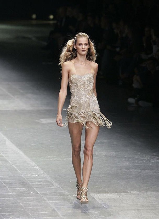 Céline Dion wearing this gorgeous Alexander McQueen SS06 Gold Metal Chain Dress